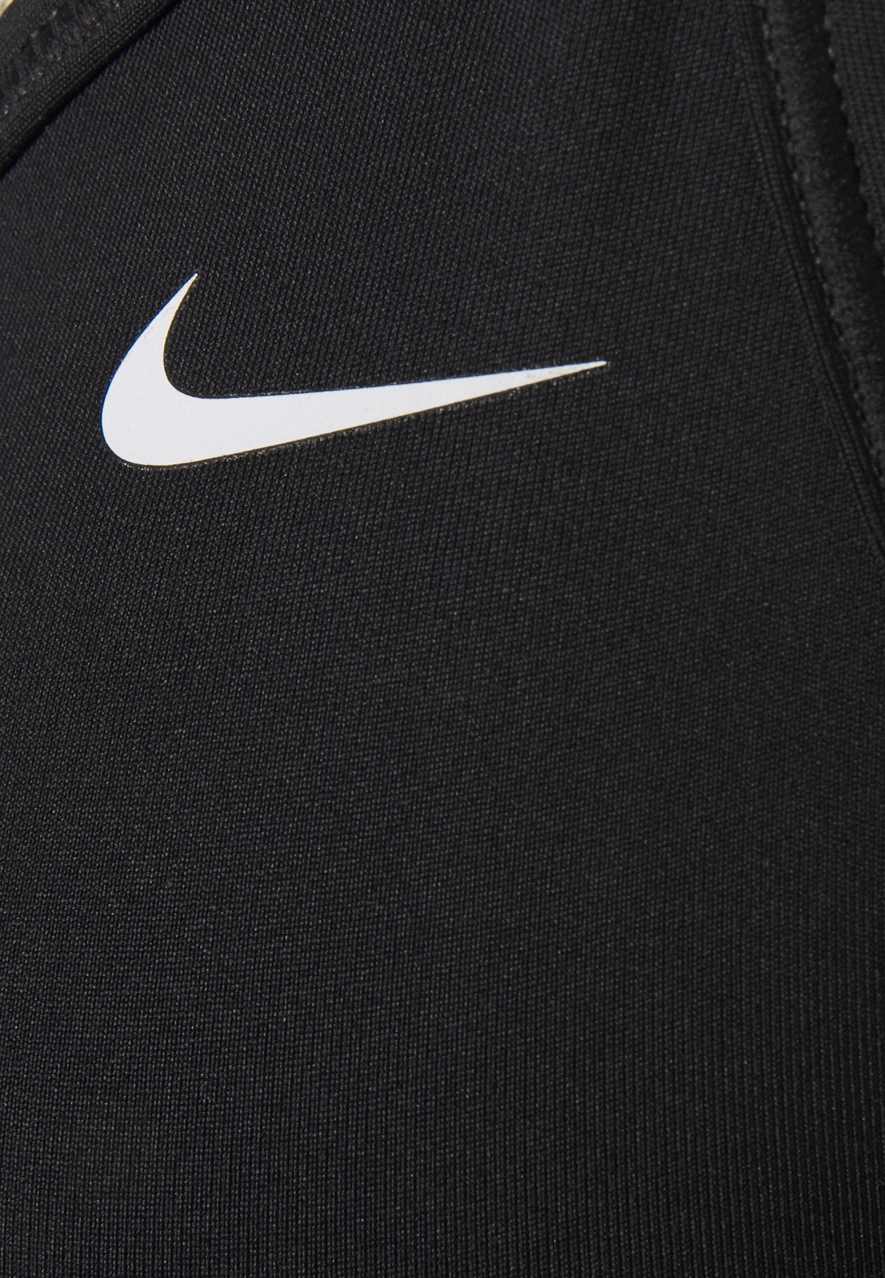 Nike sportmelltartó